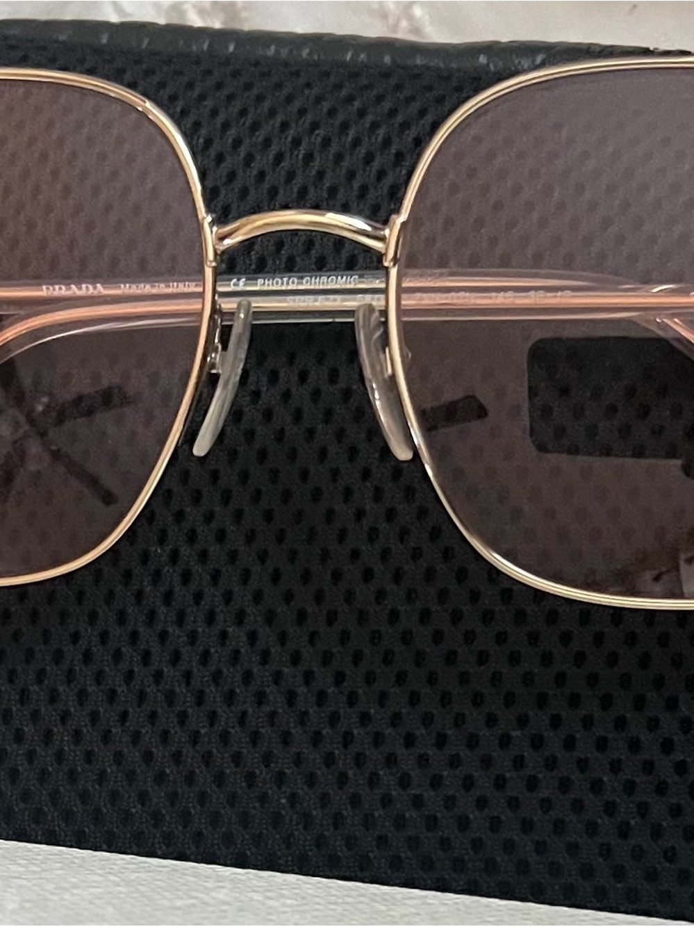 Prada Gold Frame Sunglasses with Pink-Tinted Lenses